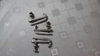 Машинки для виолончели из металла.