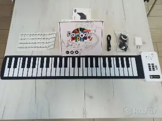 Ролл-пианино (гибкое электронное пианино)